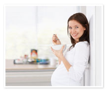 Pregant woman eating cereal